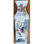 A Chinese square baluster vase famille rose decoration with figures working and/or relaxing with red