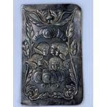 A 1920's hallmarked silver book cover embossed with cherubs, 12 x 7cm