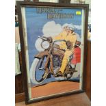 A vintage framed poster for Harley Davidson showing a c. 1920's couple on a Harley (signature H L