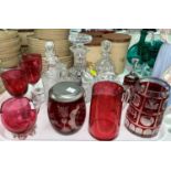 Two decanters; cranberry and other coloured glassware