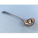A monogramed Georgian Old English patterned soup ladle, date mark unclear, 6oz, 104gm