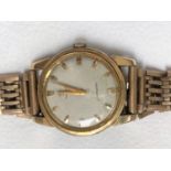 A vintage Omega Seamaster 17 jewel wristwatch with baton numerals and center seconds hand, no