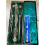 A Victorian 3 piece carving set with antler handles, cased; a paperknife