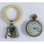 A baby's teething ring with silver bell attached, marked 'BABY' in blue enamel, Birmingham 1902