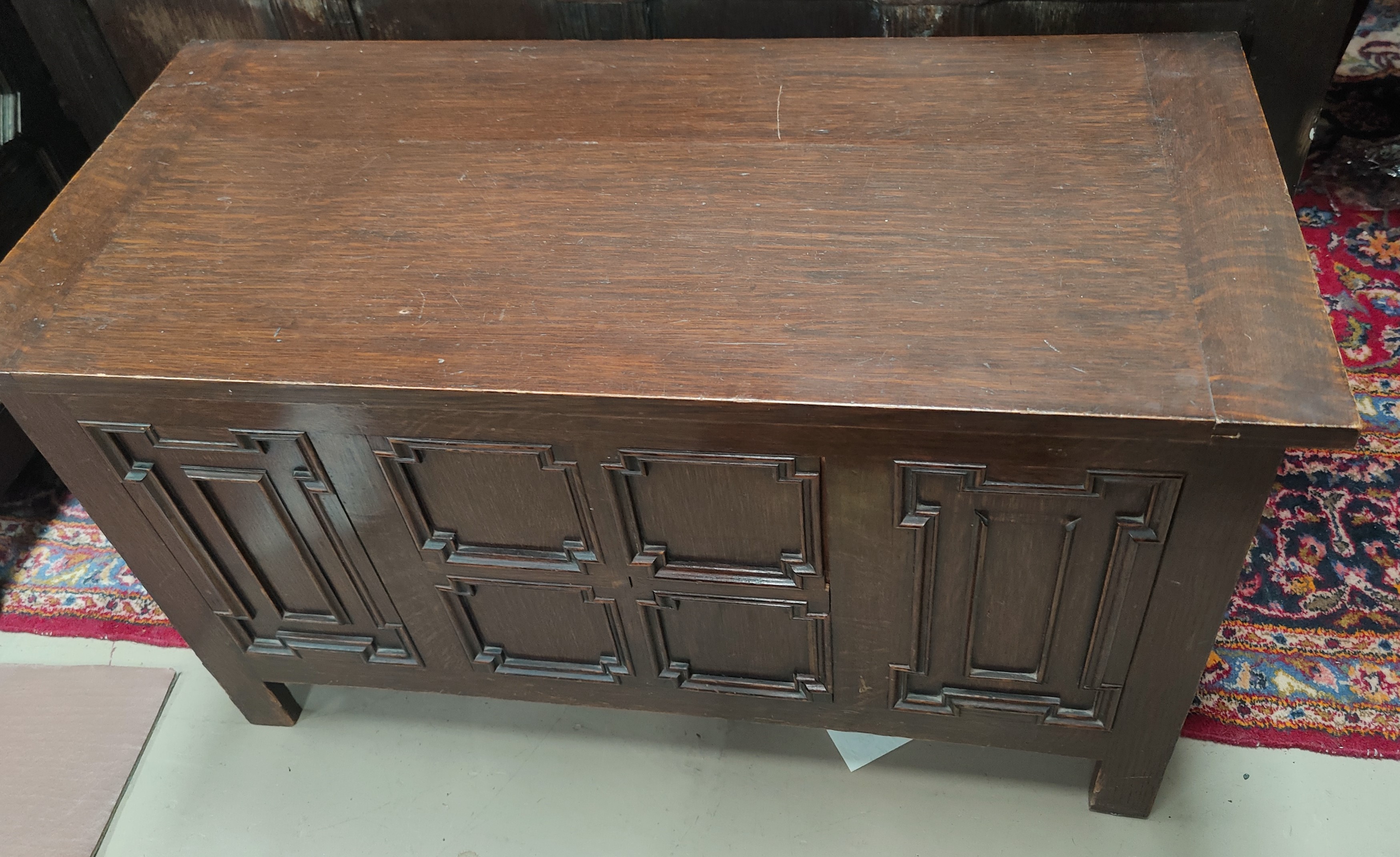 An early 20th century oak blanket box with geometric moulded decoration, width 91 cm