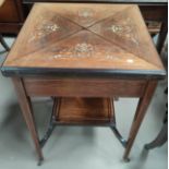 A Victorian Rosewood envelope card table with floral inlay to the top with satinwood inlay with