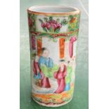 A Chinese famille vert ceramic brush pot decorated with traditional scenes, height 12.5cm