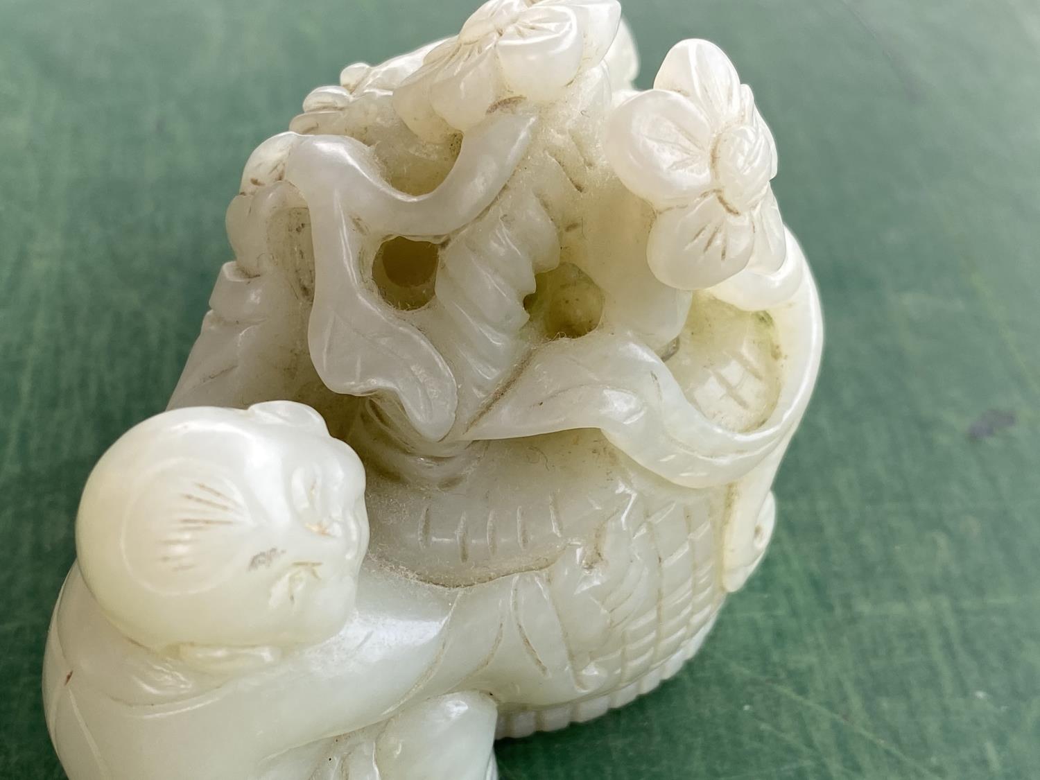 A Chinese jade coloured hardstone group of a young girl and boy with central basket of flowers - Image 2 of 5