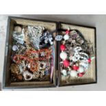 A selection of vintage costume jewellery, etc., contained in a wooden box