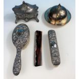 A WMF lidded small jewellery casket, a hallmarked silver brush, comb and smaller brush and another