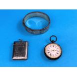 A chased white metal fob watch with gilded white dial; a hallmarked silver vesta case and bangle,