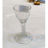 An 18th/19th century opaque white wine with twist and ogee bowl (2 small chips to foot rim)
