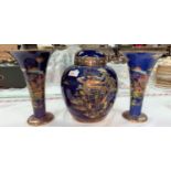 A 1930's Carltonware garniture in blue lustre with chinoiserie scenes