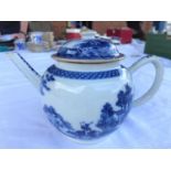 An 18th century Chinese Qianlong period blue & white teapot with detailed decoration of country sce