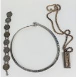 A silver ingot pendant; a silver 3d bracelet; etc.