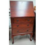 A narrow inlaid mahogany fall front bureau with 3 drawers under