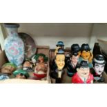 A selection of Laurel & Hardy figures various plaster wall plaques etc