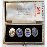 A 9 carat hallmarked gold pair of cufflinks monogrammed in blue enamel of three lions?