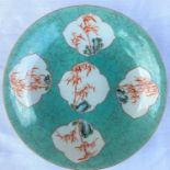 A Chinese dish with a sage coloured ground, with hand painted highlights, and five shaped panels