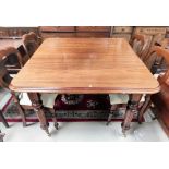 A Victorian mahogany wind out dining table with rounded rectangular top, with 1 leaf and winding