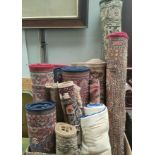 A selection of various small carpets and rugs.