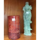 A Chinese carved female deity figure, height 26cm; a Chinese coloured swirl glass brush pot,