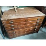 A large oak plan chest in two stacking sections 6 drawers (requires re-polishing) Depth 79cm