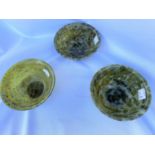 Three Chinese nefrite jade coloured hard stone tea bowls dia 10cm