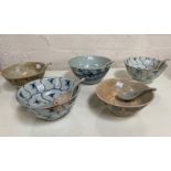 Five Chinese Tek Sing Cargo rice bowls, three large and two smaller with spoons