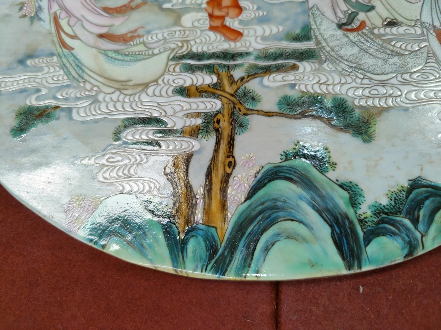 A Chinse circular porcelain plaque depicting Immortals floating in clouds, diameter 34cm (some - Image 3 of 4