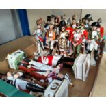 A collection of porcelain military figures