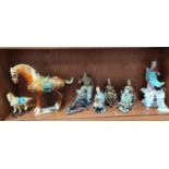 A selection of 20th century Chinese ceramic figures including immortals, martial artist, Tang