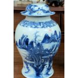 A large18th century Chinese Qianlong period blue and white inverted baluster lidded vase with
