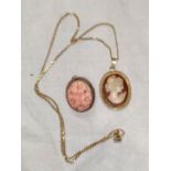 A modern cameo style pendant in 9 carat hallmarked gold surround on 9 carat hallmarked gold fine