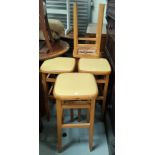 A 1960's bedside cabinet; a small 2 height display cabinet; 5 1960's stools