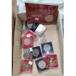 A selection of commemorative coins etc