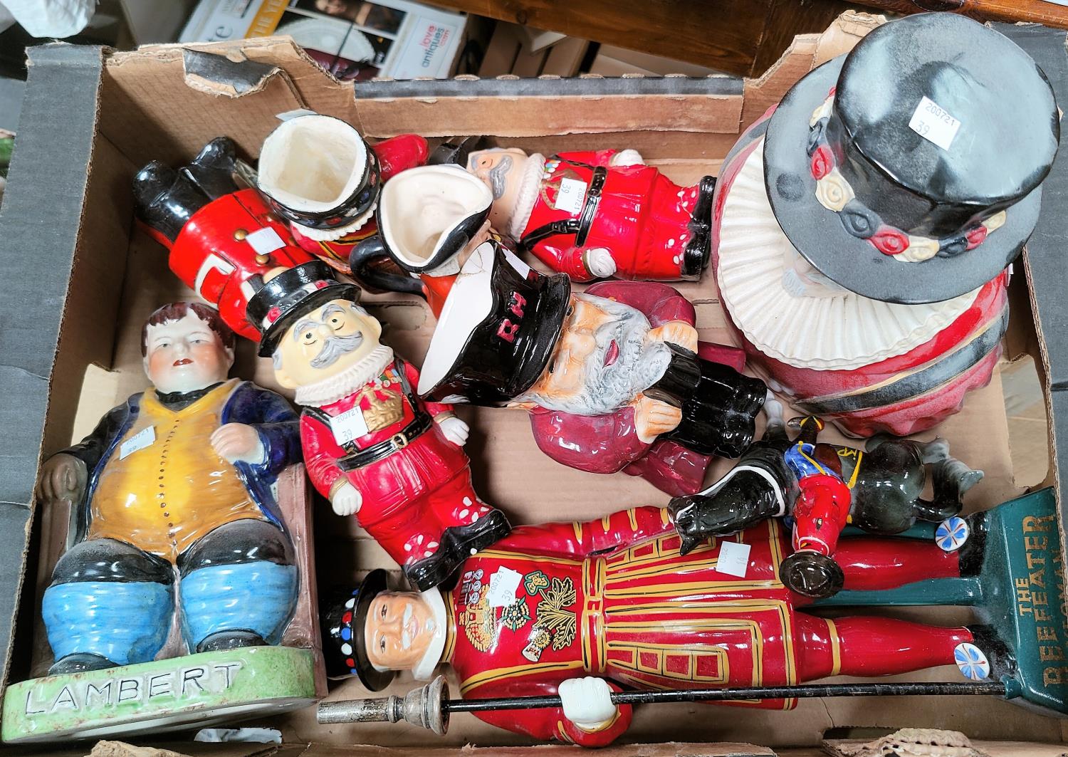 A collection of various Beefeater figures