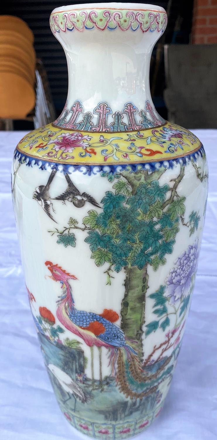 A 20th century Chinese vase decorated in polychrome with cranes, other exotic birds, flowers etc,