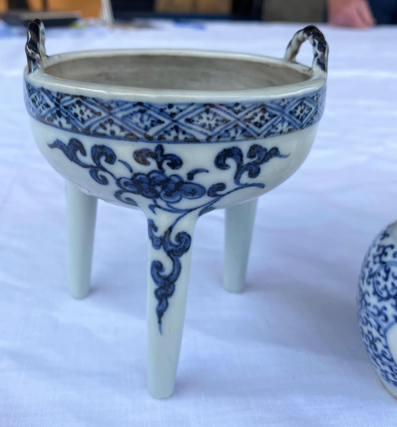 A Chinese blue and white ceramic censor stand with loop handle decoration, height 11cm; a Chinese - Image 2 of 6