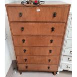 A 1950's walnut 6 height chest of drawers