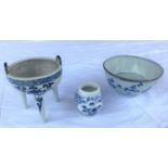 A Chinese blue and white ceramic censor stand with loop handle decoration, height 11cm; a Chinese