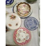 A selection of various decorative plates and dishes