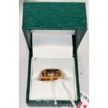 An 18 carat hallmarked gold barrel shaped wedding ring, 8 gm, size N