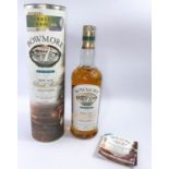 A bottle of Bowmore Legend Single Malt Isla Scotch Whiskey with original box and CDRom 70cl 40% vol