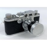 A LEICA 111c chrome 35mm camera c.1950, serial No.515800, with 50mm f3.5 Elmar lens, leather E.R