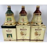 Three Bells Fine Old Scotch Whiskey decanters boxed with contents, all aged 8 years 2 x 1997