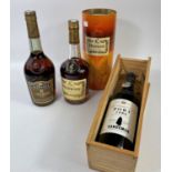 A 70 cl bottle of Sandeman LBV 1986 port, boxed; a 70 cl bottle of Martell brandy; a 70 cl bottle of