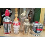 A 1930's style chrome soda siphon and ice bucket; a silver plated cocktail shaker etc