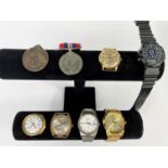 A Gents Pulsar Wristwatch; other watches; a WW2 medal etc.