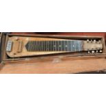 A vintage scratch built 8 string slide guitar (in need of restoration a.f)